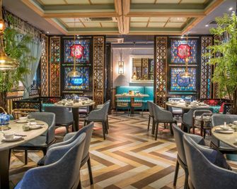 Xinyuexin Hotel - גואנגג'ואו - מסעדה