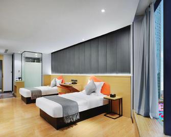 Iu Hotel Chongqing Jiefangbei - Chongqing - Bedroom