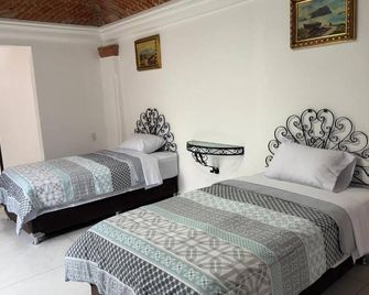 La Finca Tilhuacán - San Juan Pueblo Nuevo - Ložnice