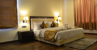 The Legend Hotel - Prayagraj - Schlafzimmer