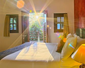 Puri Sading Hotel - דנפסאר - חדר שינה