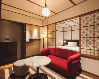 Mampei Hotel - קארויזאווה - חדר שינה