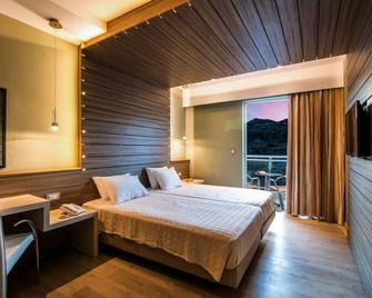 Pegasos Deluxe Beach Hotel - Ammoudes - Schlafzimmer
