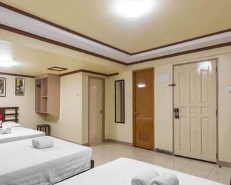 Dayview Tourist Home - טאגבילאראן סיטי - חדר שינה