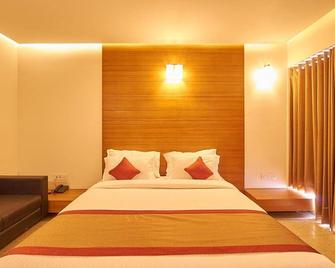 7wonders Hotel Gandhinagar - Gandhinagar - Schlafzimmer
