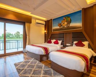 Lumbini Palace Resort - Lumbini Sanskritik - Bedroom
