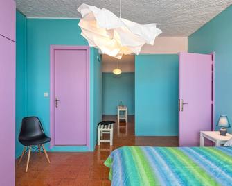 THE BONGOS - Socially Conscious Rooms, Part of the room rate goes to charity - Maleme - Schlafzimmer