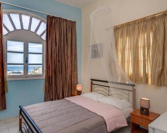 Onar Rooms & Studios - Perissa - Soveværelse