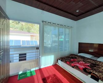 Amar Resort Chopta Tungnath - Chamoli - Bedroom