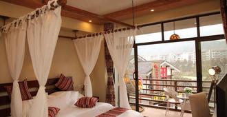 Zhangjiajie Towo Holiday Hotel - Zhangjiajie - Bedroom