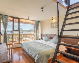 Lugu Lake 97 Rendezvous Lakeside Resort (Puluo Flower Sea Wharf Branch) - Lijiang - Bedroom