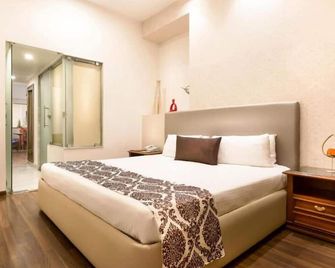 GRT Regency Kanchipuram - Kanchipuram - Bedroom