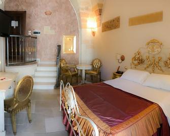 Kelina Charme Hotel by Cantine Due Palme - Cellino San Marco - Bedroom