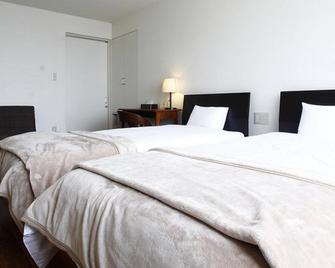 Hachikita Onsen Ryokan SASAYA - Kami - Schlafzimmer