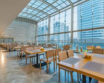 Venus International Hotel Kunming Baiyun Road Tongde Square - Kunming - Restaurante