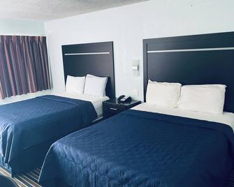 Executive Inn - Muskogee - Bedroom