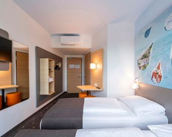 B&B Hotel Augsburg-Nord - Άουγκσμπουργκ - Κρεβατοκάμαρα
