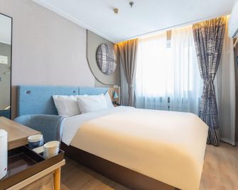 Home Inn Neo Qiqihar Railway Station - Qiqihar - Habitación