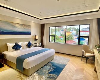 Ocean Delight Boutique Hotel - Sihanoukville - Schlafzimmer