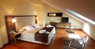 Hotel Spa Paris - León - Bedroom