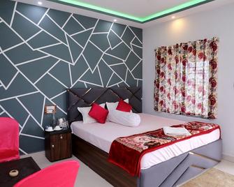 The Pavilion Beach Resort - Adjacent to Beach - Mandarmani - Schlafzimmer