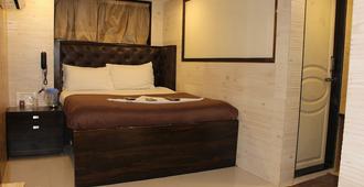 Hotel Qamar - Mumbaj - Sypialnia