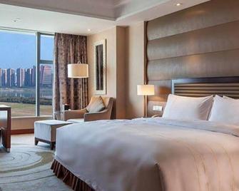 Regal International Sungdo Hotel - Nanchong - Slaapkamer