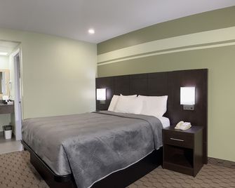 Budget Inn - Port Hope - Schlafzimmer