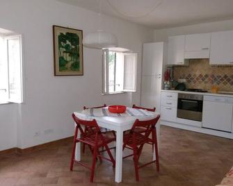 Apartment in home - Porto Azzurro - Dining room