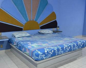 Motel Harrisson Villas & Suites - Куаутла (Морелос) - Спальня