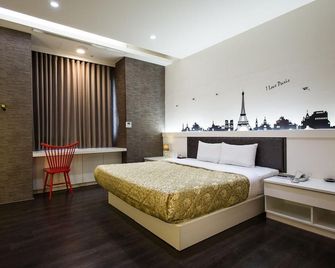 Yuan Chyau Motel - טאיצ'ונג - חדר שינה