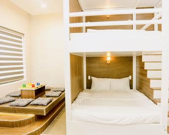 كيويز هومستاي آند كافيه - Ấp Thiện Phước - غرفة نوم