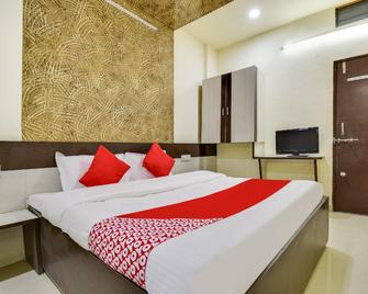 OYO Hotel Aryan - Khāmgaon - Habitación