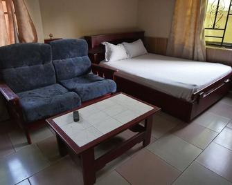 Tim Freeman Guest House - Kumasi - Huiskamer