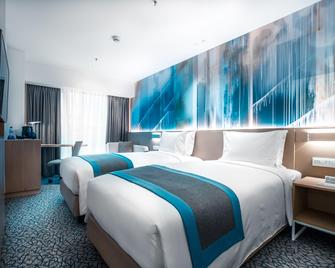 Holiday Inn Express Manila Newport World Resorts By IHG - פאסאי סיטי - חדר שינה