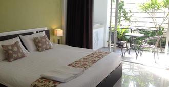 Natnalin Hotel - Chiang Rai - Schlafzimmer