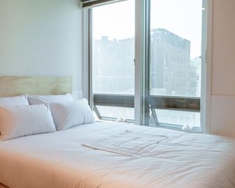 Step Inn Myeongdong 2 - Hostel - סיאול - חדר שינה