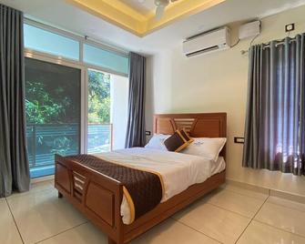 Grand Residency & Resort - Varkala - Bedroom