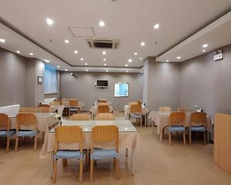 Motel Harbin Convention And Exhibition Center Steam Turbine Agricultural University - Harbin - Restaurant