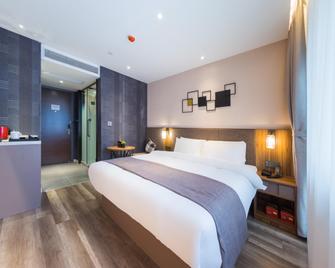 Motel Guiyang Dashizi Shengfu Road - Guiyang - Bedroom