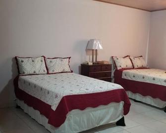 B&D Lodgings - Tocumen - Quarto
