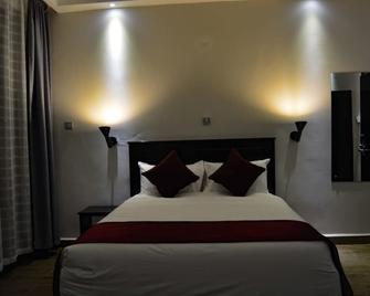 The Hotel Ezri - Meru - Bedroom