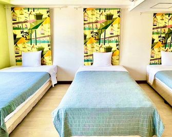 Hotel Happy Holiday Ishigaki - Ishigaki - Soveværelse