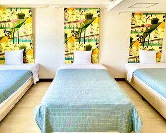 Hotel Happy Holiday Ishigaki - אישיגאקי - חדר שינה
