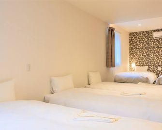 ساكورا جاردن هوتل - أوساكا - غرفة نوم