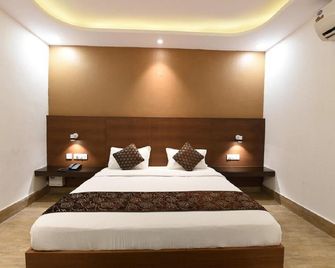 Hotel O Under Bridge Inn - Nueva Delhi - Habitación