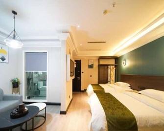 Greentree Alliance Jiangxi Shangrao Yiyang County Zhimin Aveune Yingbin Avenue Hotel - Shangrao - Bedroom