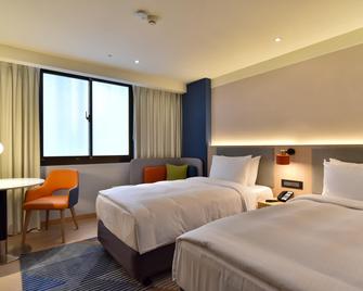 هوليداي إن إكسبرس تايبي ترين ستيش ا باي آيتش جي - مدينة تايبيه - غرفة نوم