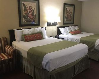Residence Hub Inn and Suites - Marianna - Camera da letto