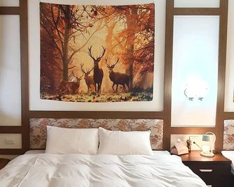 On One Side - Lugu Township - Bedroom
